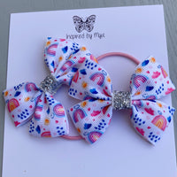 Elastic Bow Piggy Pair - Rainbows