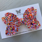 Alani Bow - Rainbow Red Glitter