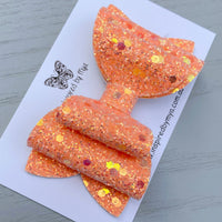 Charlotte Bow - Orange Sparkles Glitter